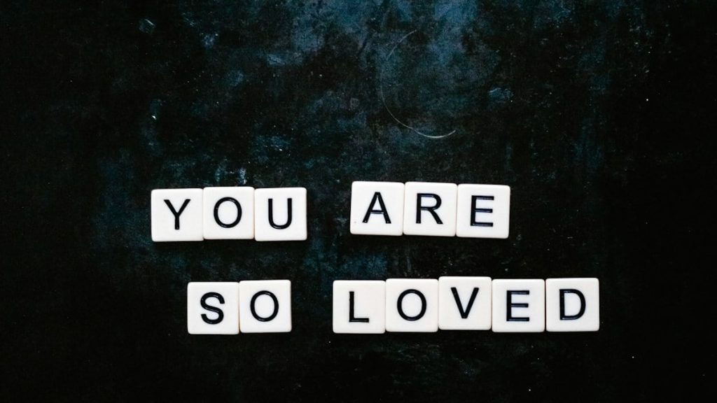You are so loved spelt out using Scrabble letters flatlay